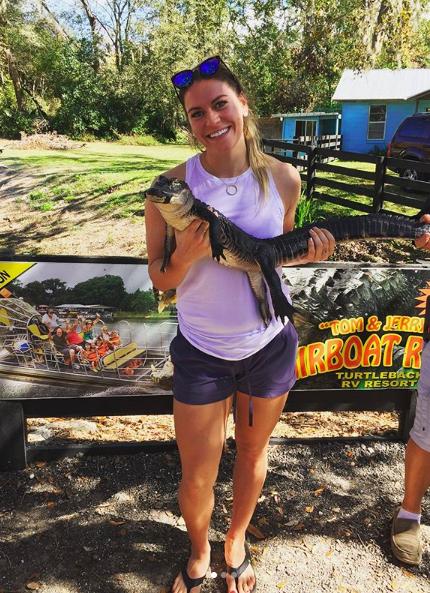 holding gator airboat ride